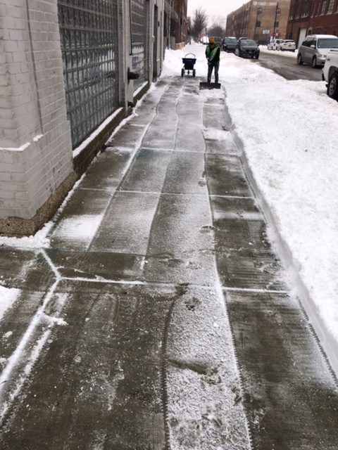 Shoveling snow from sidewalks Chicago