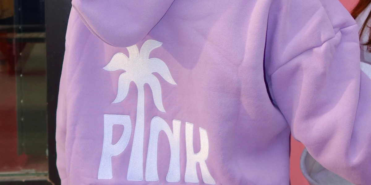 The Pink Palm Puff Hoodie: A Statement of Urban Cool and Creative Comfort