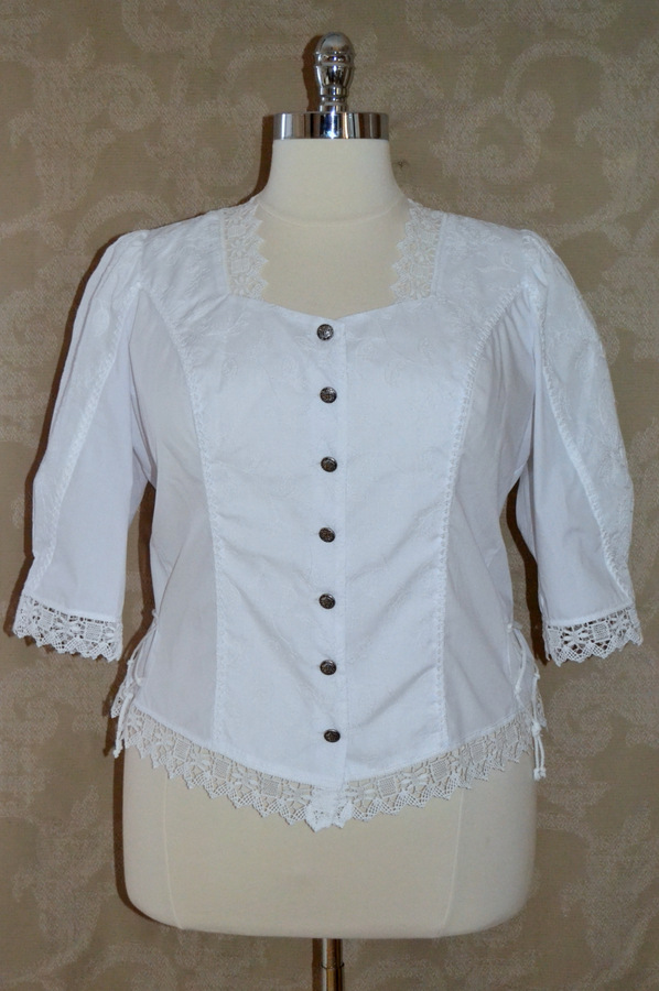 White cotton blouse with tone on tone embroidery details