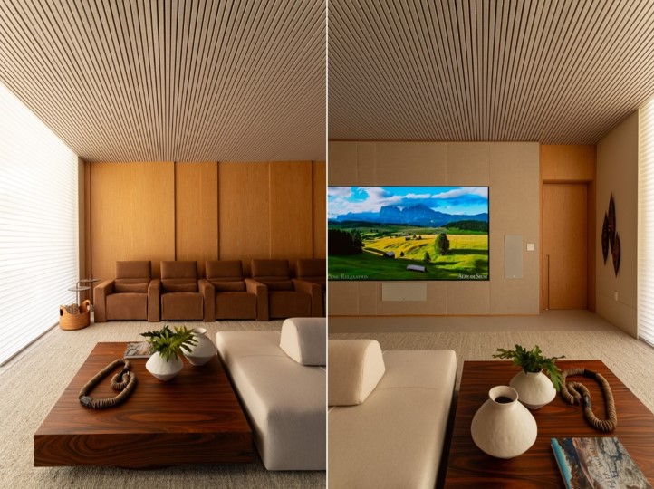 Todo o espaço foi planejado para ser uma sala de cinema completa, contando com isolamento acústico, inclusive no forro, as poltronas de cinema reclináveis proporcionam uma experiência completa | Projeto: Patricia Penna Arquitetura & Design| Fotos: Leandro Moraes