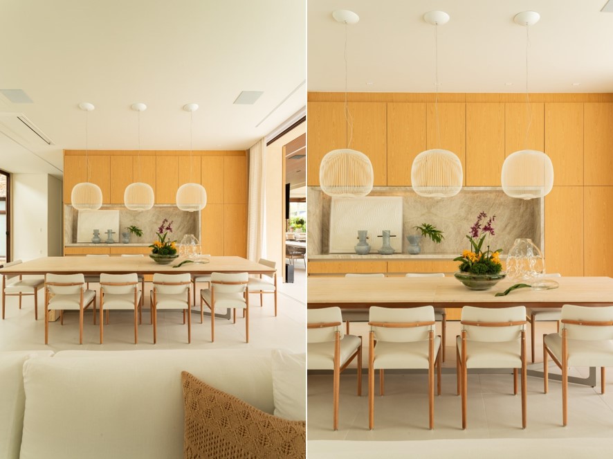 Para a sala de jantar, a iluminação ganhou destaque com três pendentes da Foscarini. O nicho interno também ganhou iluminação, deixando toda a marcenaria sob medida da Ornare ainda mais reluzente | Projeto: Patricia Penna Arquitetura & Design| Fotos: Leandro Moraes